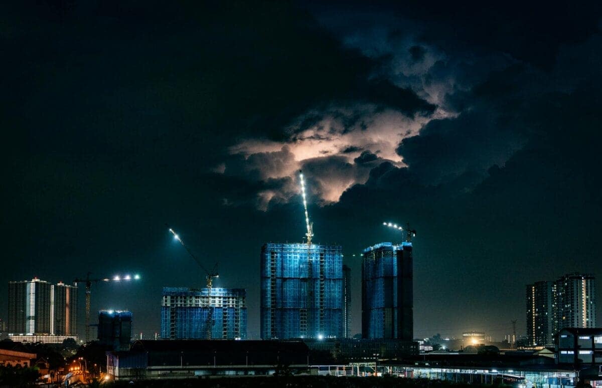 City skyline with thunderstorm at night